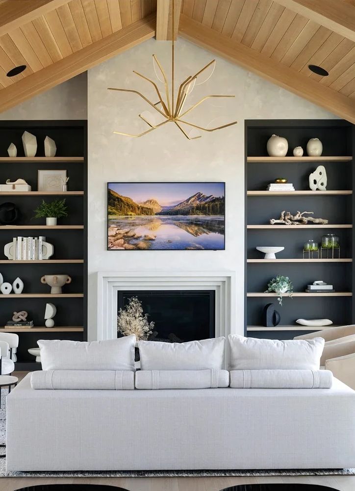 Control4 Touch panel in a able with a traditional home in the background